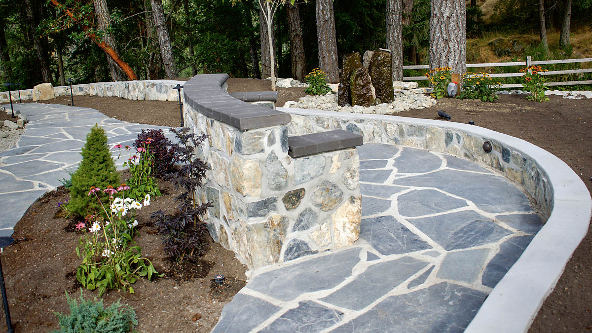 Masonary and natural stone seat and flagstone patio