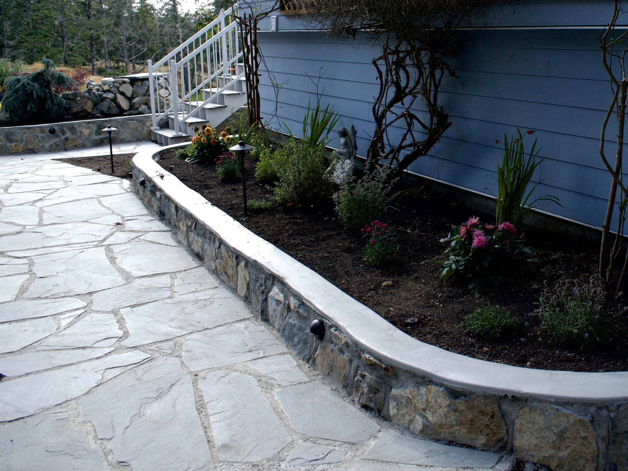 natural stone slate path and rock wall