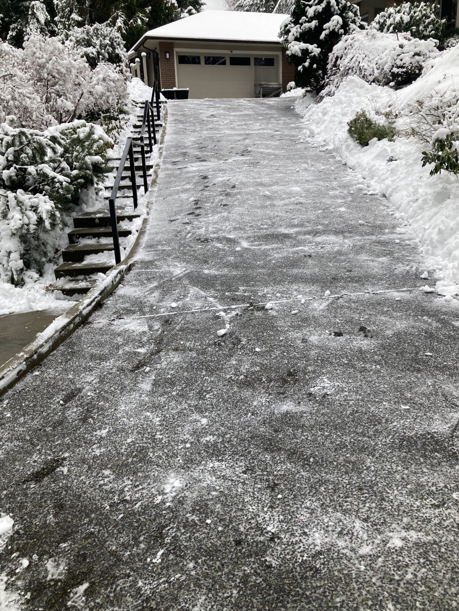 Snow removed from steep driveway