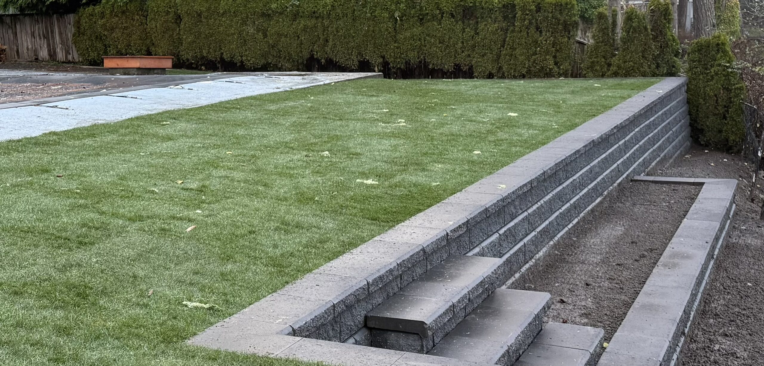 allan block wall with lawn on top